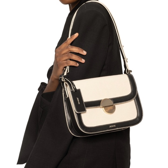 Jason Wu
Orbit Canvas / Leather Shoulder Bag NWT Color Beige/ Black - Picture 5 of 14